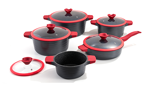 Why does my new aluminum pot turn black when I boil water? How can I fix it?